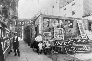 Harry Wildman painting a sign for Majestic Baths at Wildman Co. Sign Shop in Coney Island. The location appears to be Kensington Walk. Photo courtesy of Randy Profeta and Deirdre Bitting.