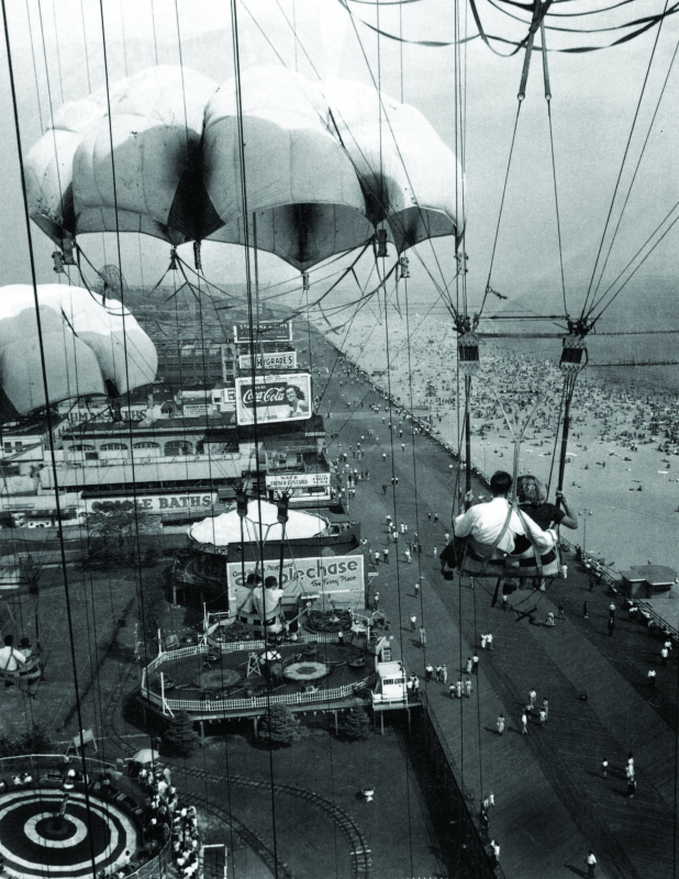Parachutes descend from the Parachute Jump Coney Island History Project